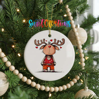 Reindeer Girl in Red Dress Christmas ornament hanging on a decorated Christmas tree