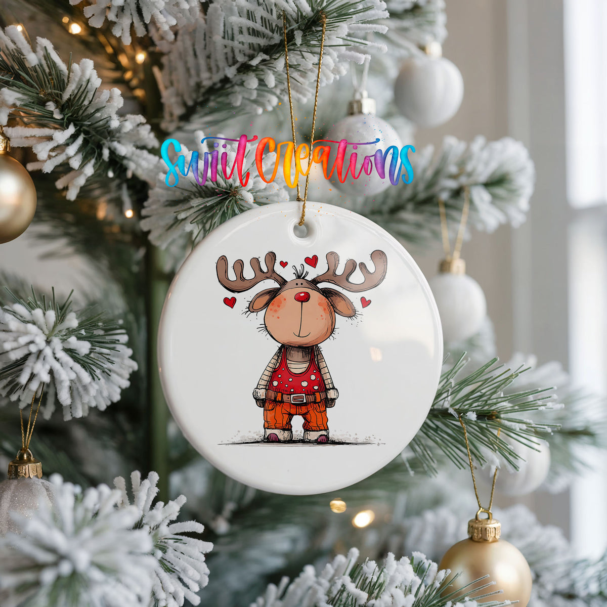 Reindeer Girl in Red Dress Christmas ornament hanging on a frosted Christmas tree