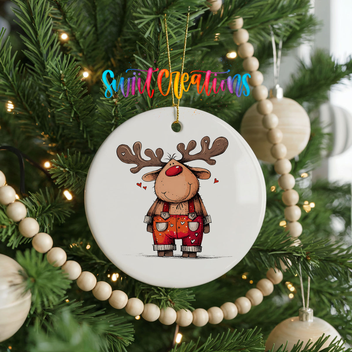 Reindeer in Red Plaid Overalls Christmas ornament hanging on a decorated Christmas tree