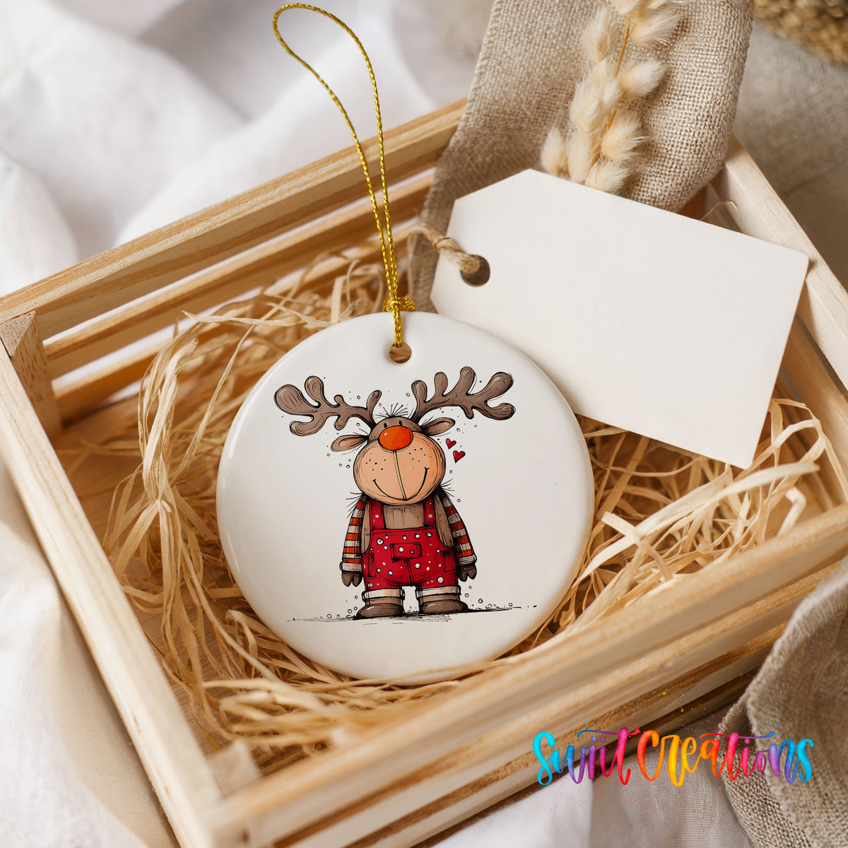 Reindeer Girl in Red Plaid Dress Christmas ornament presented in a rustic wooden gift crate