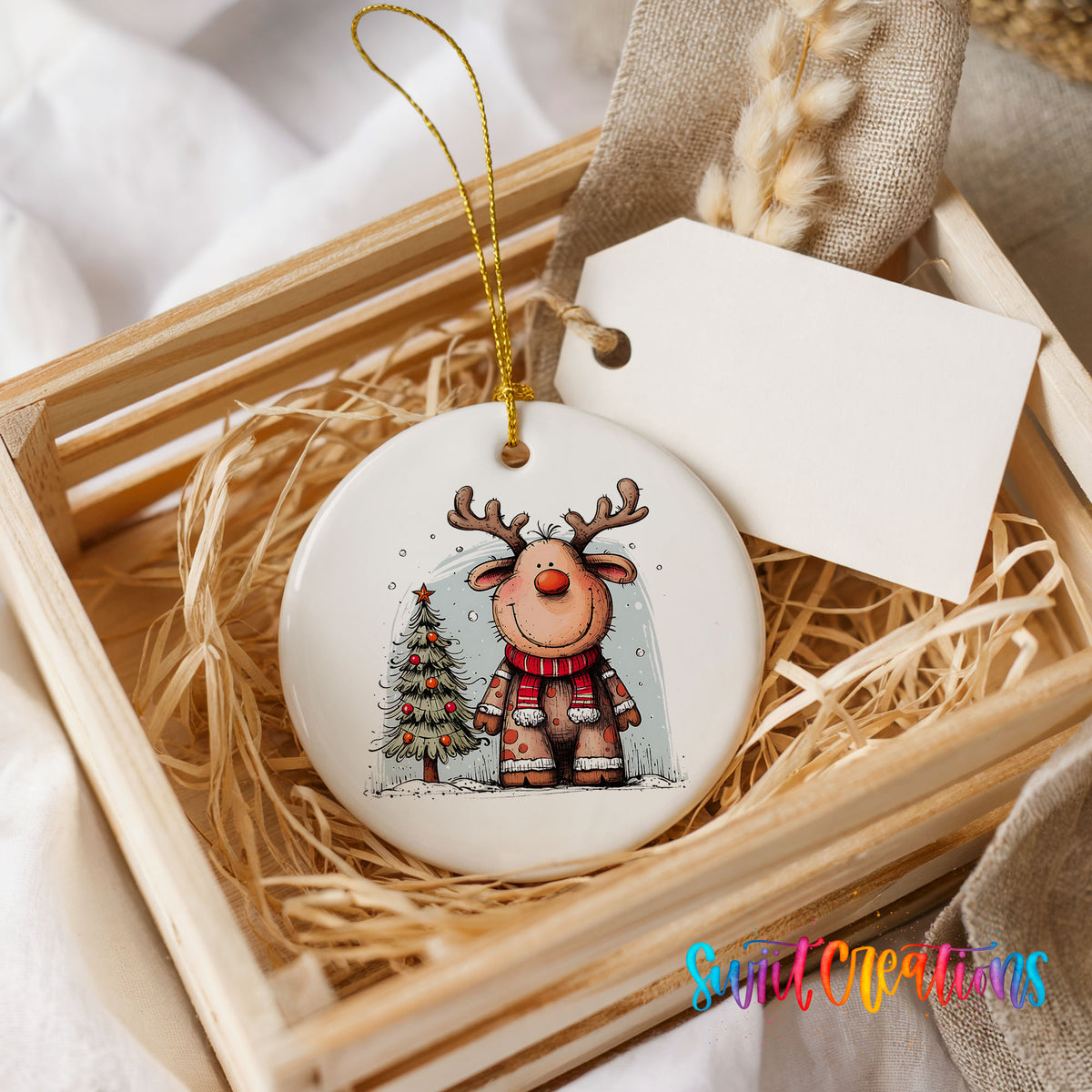 Reindeer in Red Scarf with Pine Trees Christmas ornament presented in a rustic wooden gift crate