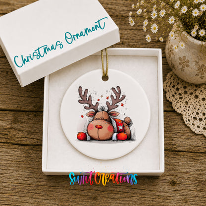 Cute Reindeer with Red Gift Bag Christmas ornament displayed in an included gift box