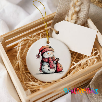 Snowman in Red Scarf with Gift Christmas ornament presented in a rustic wooden gift crate