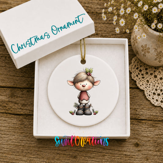 Whimsical Elf with Candy Cane ceramic Christmas ornament displayed in gift box