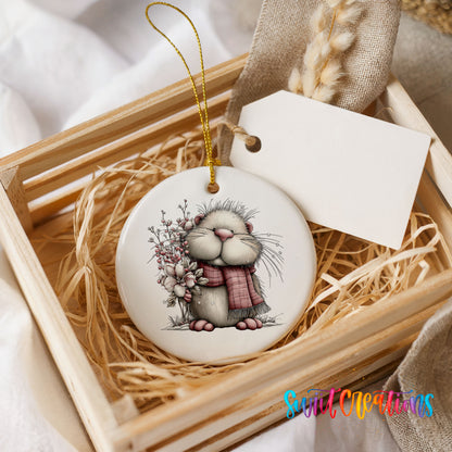fluffy mouse in a pink scarf with flowers and berries ceramic Christmas ornament displayed in a wooden gift crate