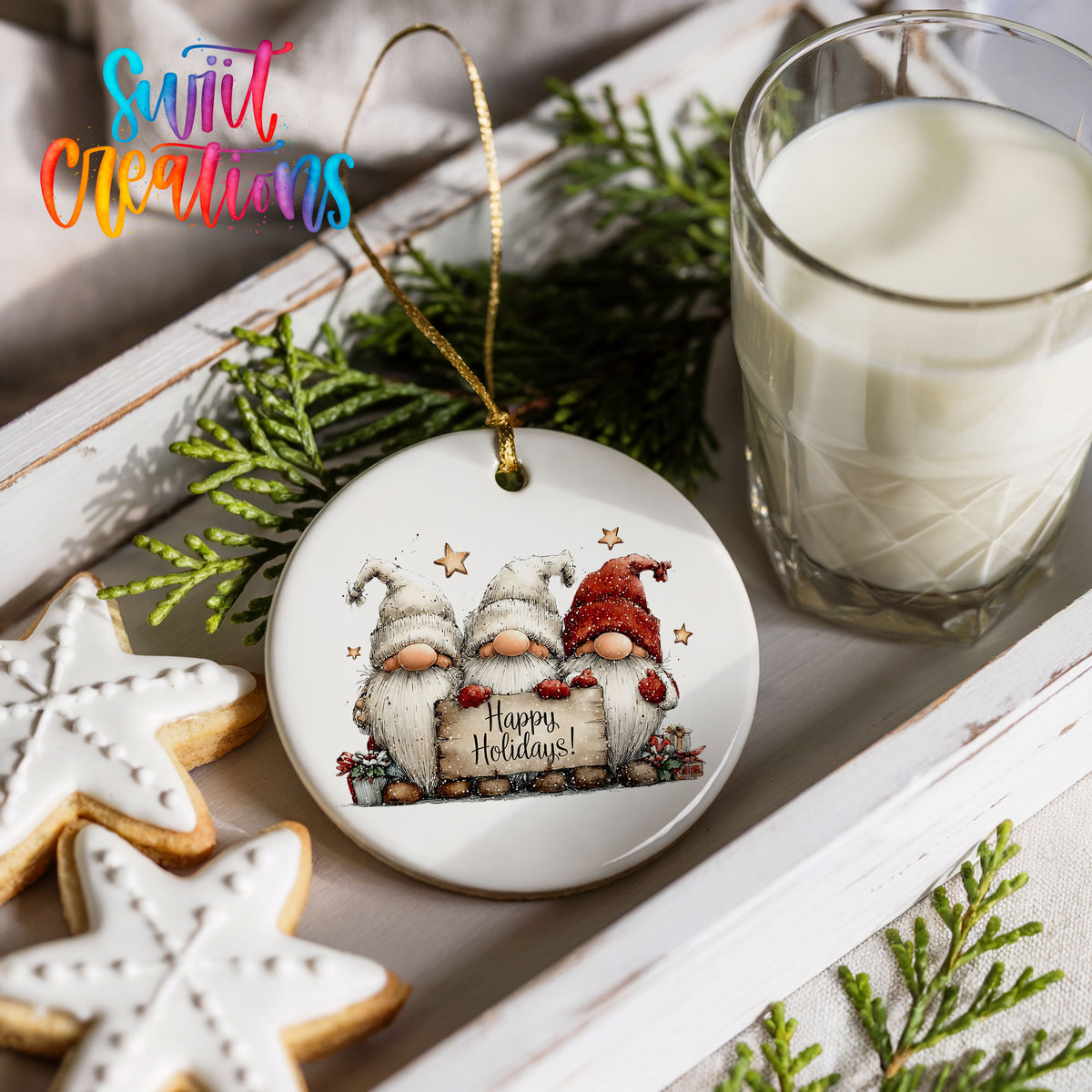 whimsical Christmas characters with a Happy Holidays message ceramic Christmas ornament styled with holiday cookies and a candle