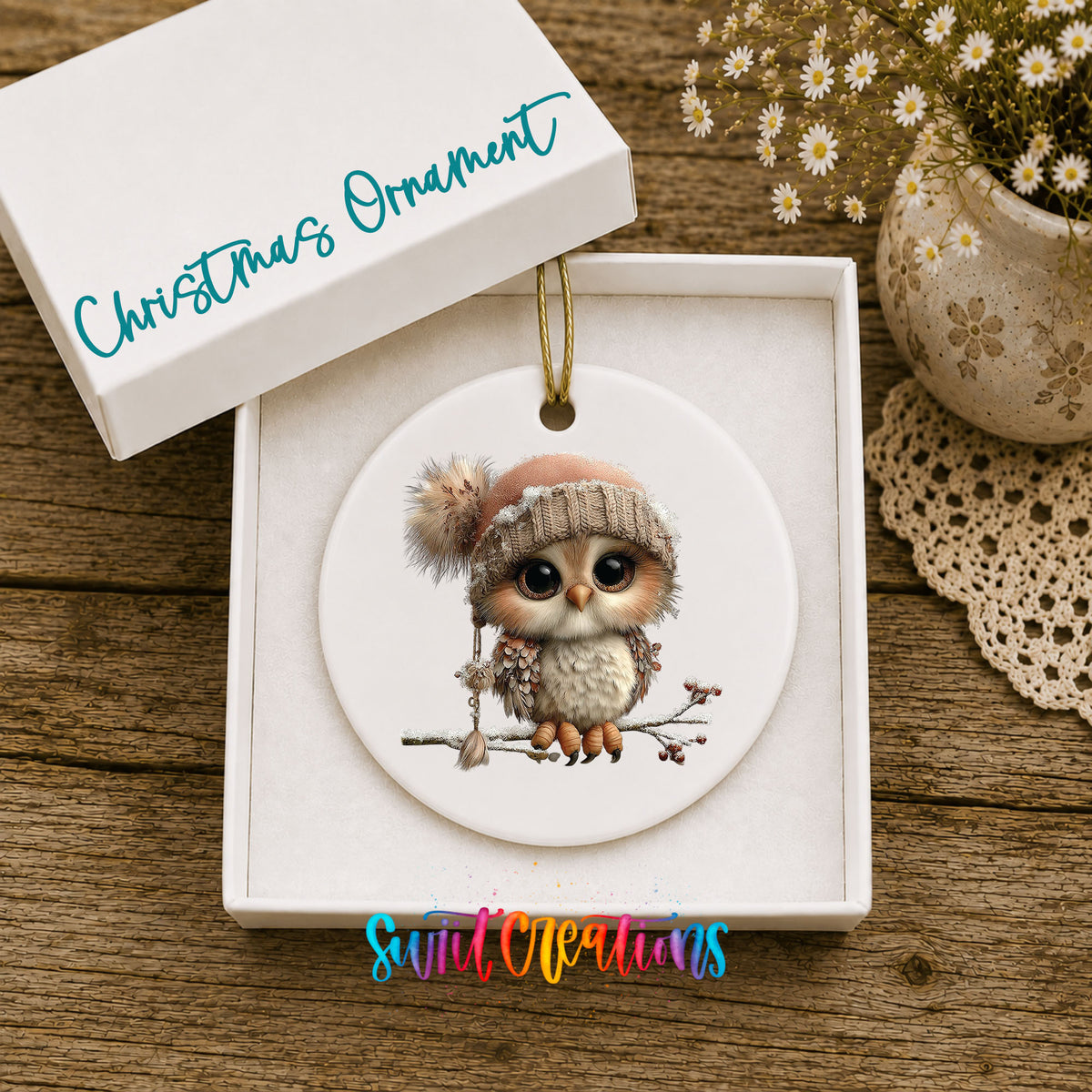 winter owl perched on a snowy branch ceramic Christmas ornament presented in a gift box