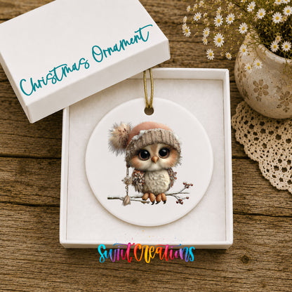 winter owl perched on a snowy branch ceramic Christmas ornament presented in a gift box