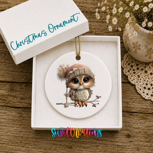 winter owl perched on a snowy branch ceramic Christmas ornament presented in a gift box
