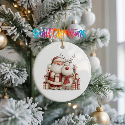 Santa Claus and reindeer beside wrapped Christmas gifts ceramic Christmas ornament hanging on a frosted Christmas tree