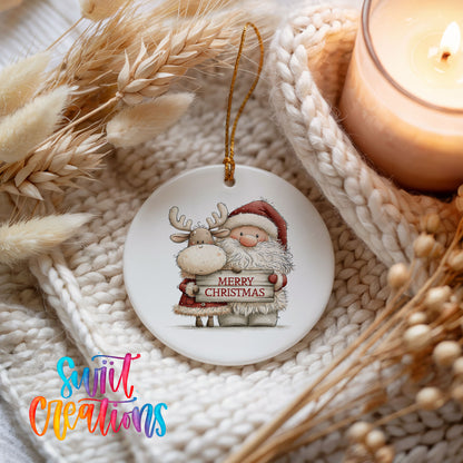 Santa Claus hugging a reindeer holding a Merry Christmas sign ceramic Christmas ornament styled on a cozy knit blanket