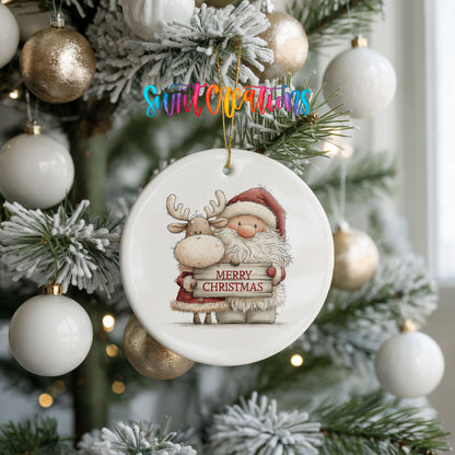 Santa Claus hugging a reindeer holding a Merry Christmas sign ceramic Christmas ornament hanging on a frosted tree with ornaments