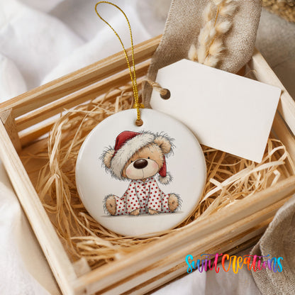 teddy bear in a Santa hat and pink polka dot scarf ceramic Christmas ornament displayed in a wooden gift crate