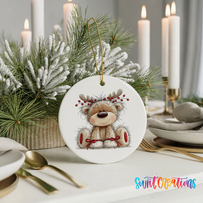 teddy bear wearing reindeer antlers with red winter skis ceramic Christmas ornament shown in a holiday table setting