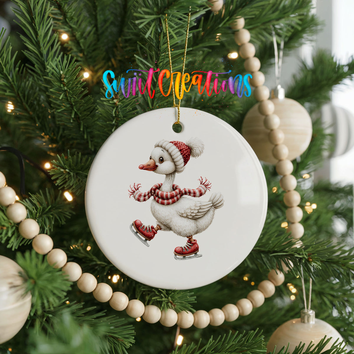 ice skating Christmas goose in a striped scarf ceramic Christmas ornament hanging on a green Christmas tree