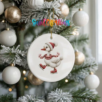 ice skating Christmas goose in a striped scarf ceramic Christmas ornament hanging on a frosted tree with ornaments