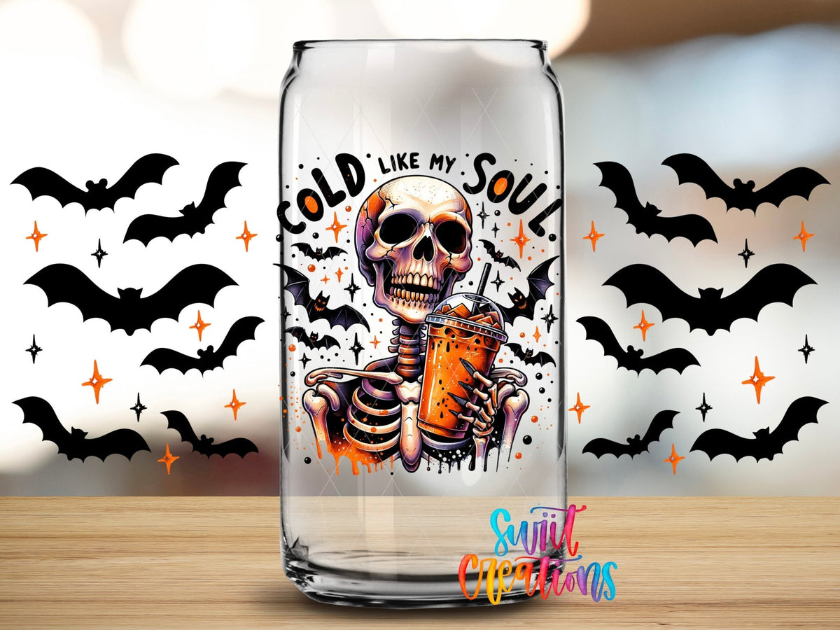 Close-up of the Cold Like My Soul UV DTF full wrap on a clear glass can