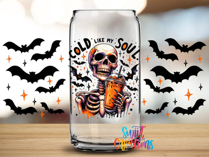 Close-up of the Cold Like My Soul UV DTF full wrap on a clear glass can