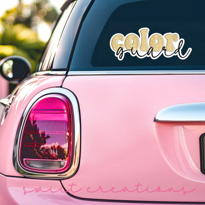 Gold Glitter Color Guard sticker on the back window of a pink car