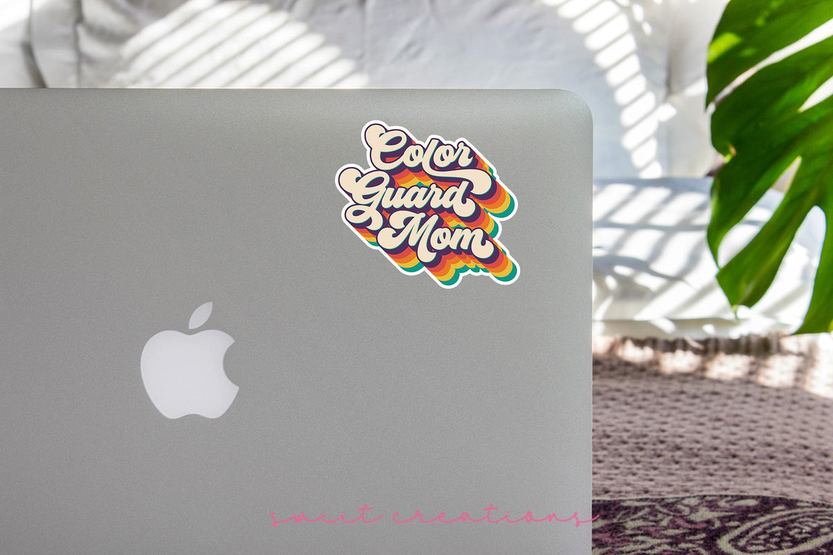 Retro Color Guard Mom sticker on the lid of a silver laptop