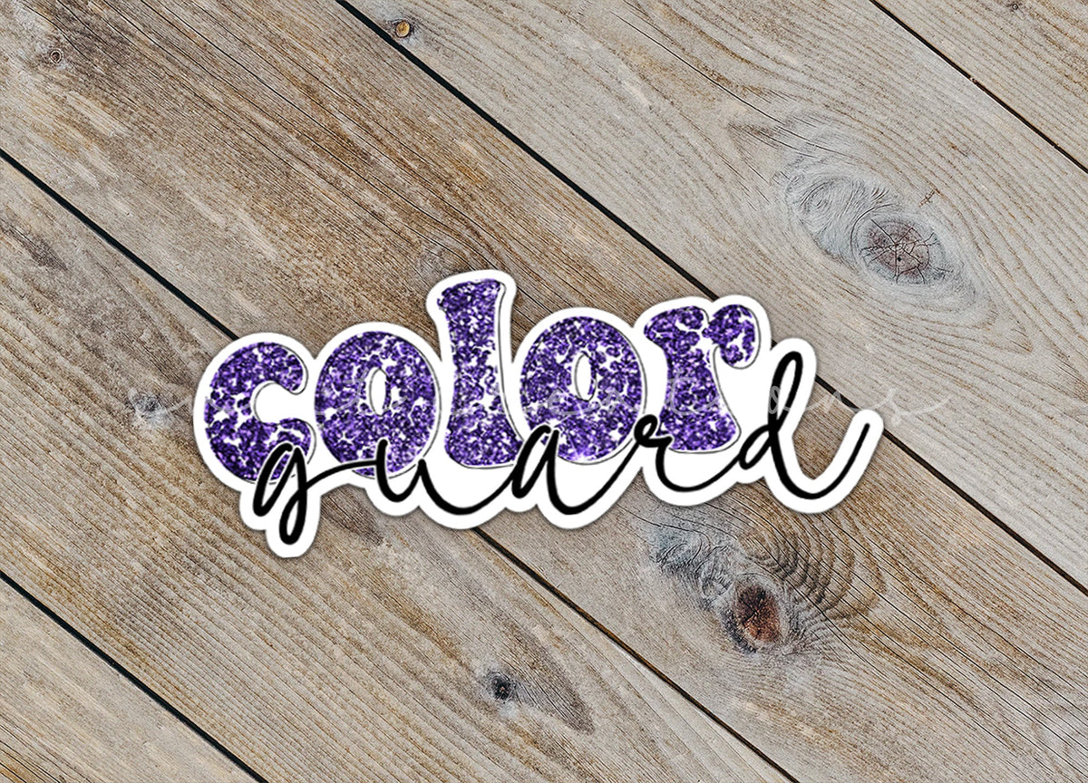 Close-up of the Purple Glitter Color Guard sticker on rustic wood
