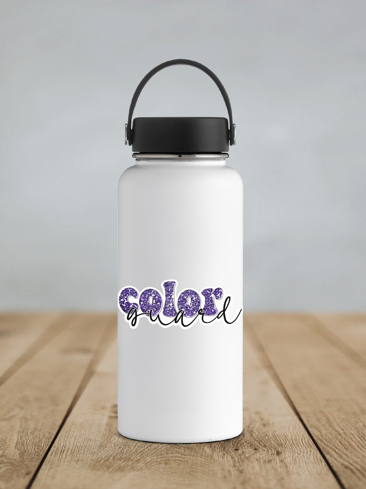Purple Glitter Color Guard sticker on a white insulated water bottle