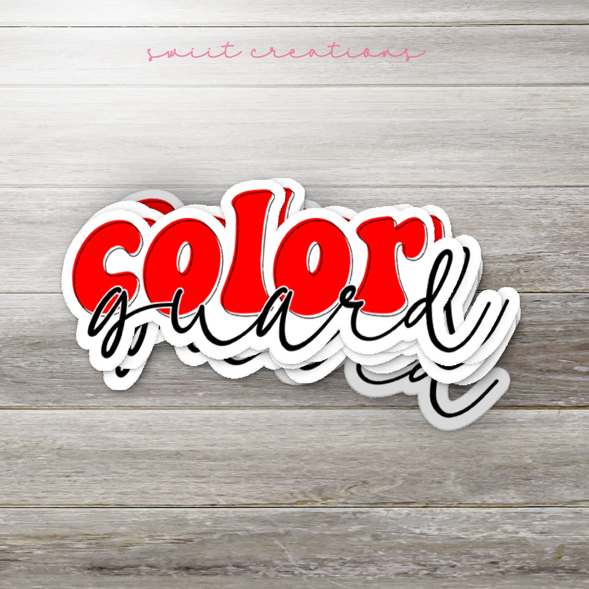Stack of Red Retro Color Guard glossy stickers on a gray wood table