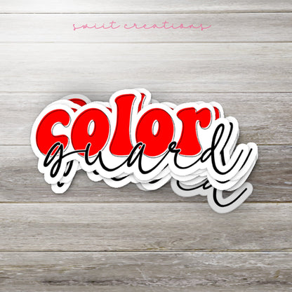 Stack of Red Retro Color Guard glossy stickers on a gray wood table