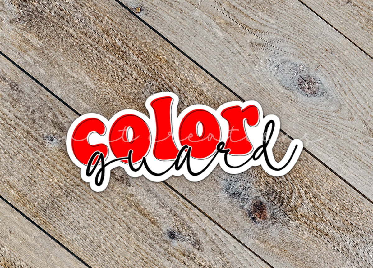 Close-up of the Red Retro Color Guard sticker on rustic wood