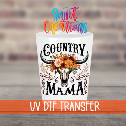Country Mama UV DTF transfer on a white shot glass in front of a brick wall