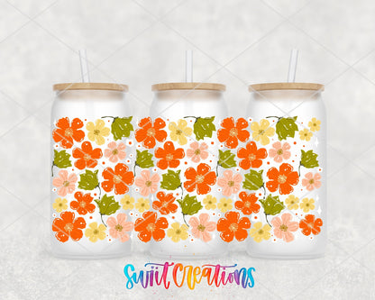 Cozy Fall Flowers UV DTF full wrap on three frosted glass cans