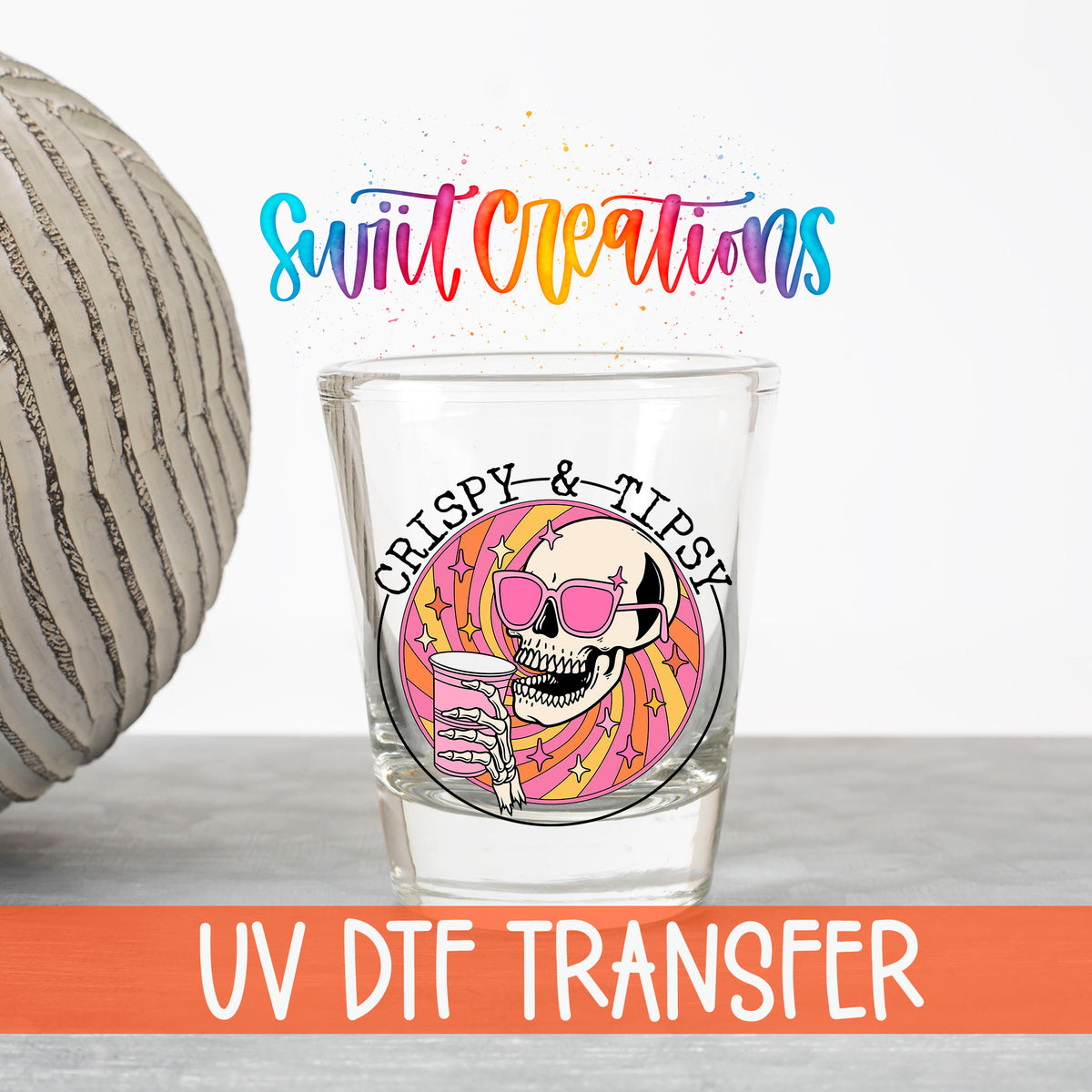 Crispy and Tipsy UV DTF transfer on a clear shot glass with the Swiit Creations logo and UV DTF Transfer banner