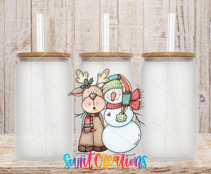 Reindeer and Snowman UV DTF transfer on frosted glass cans with bamboo lids