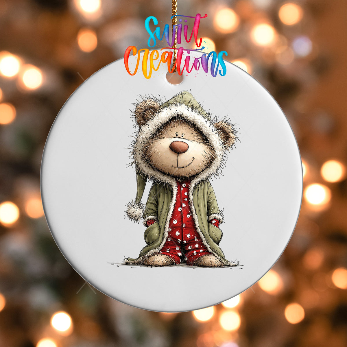 Close-up of the Teddy Bear in Hooded Pajamas UV DTF transfer on a round white ornament