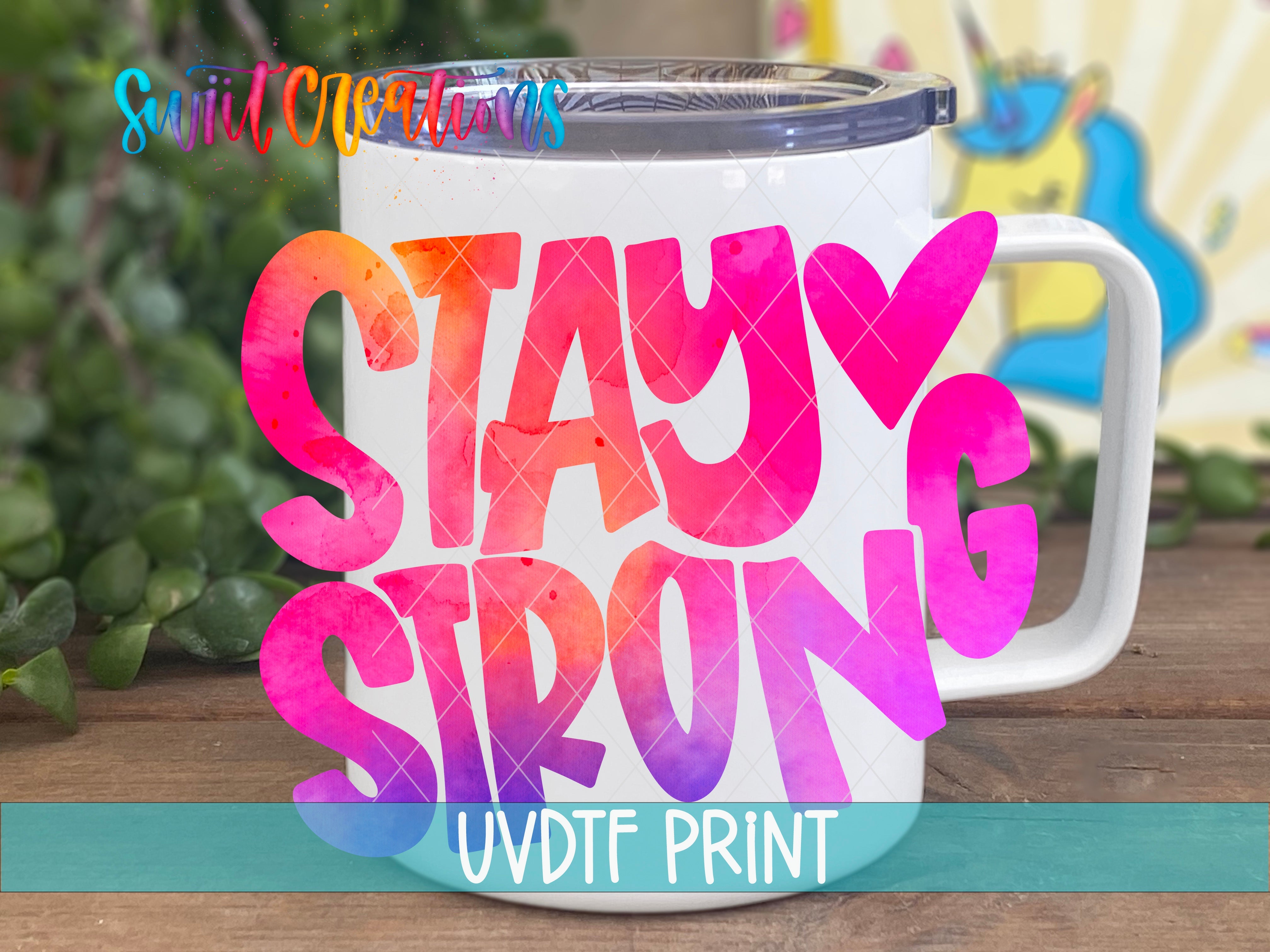 a white coffee mug with the words stay strong on it