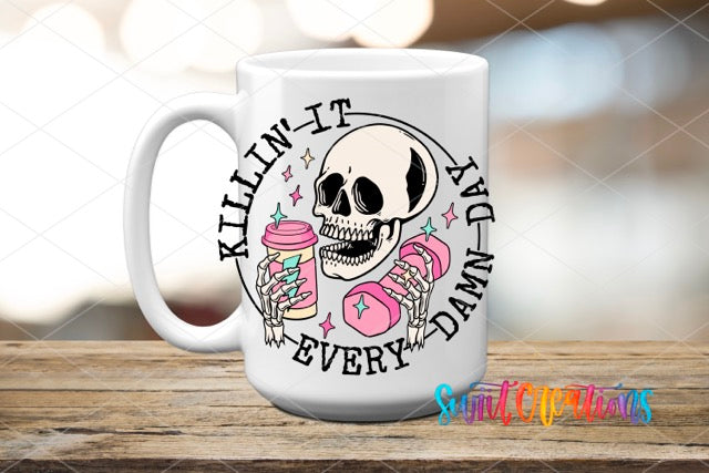 a white coffee mug with a skull holding a donut