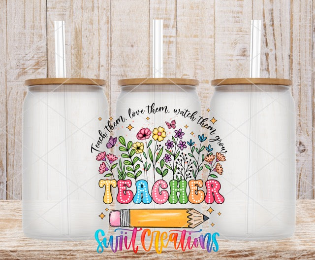two coffee mugs with the words teacher and flowers on them