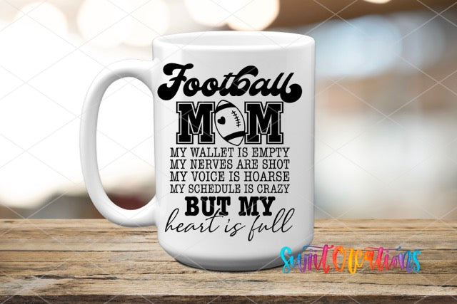 a coffee mug with a football mom on it