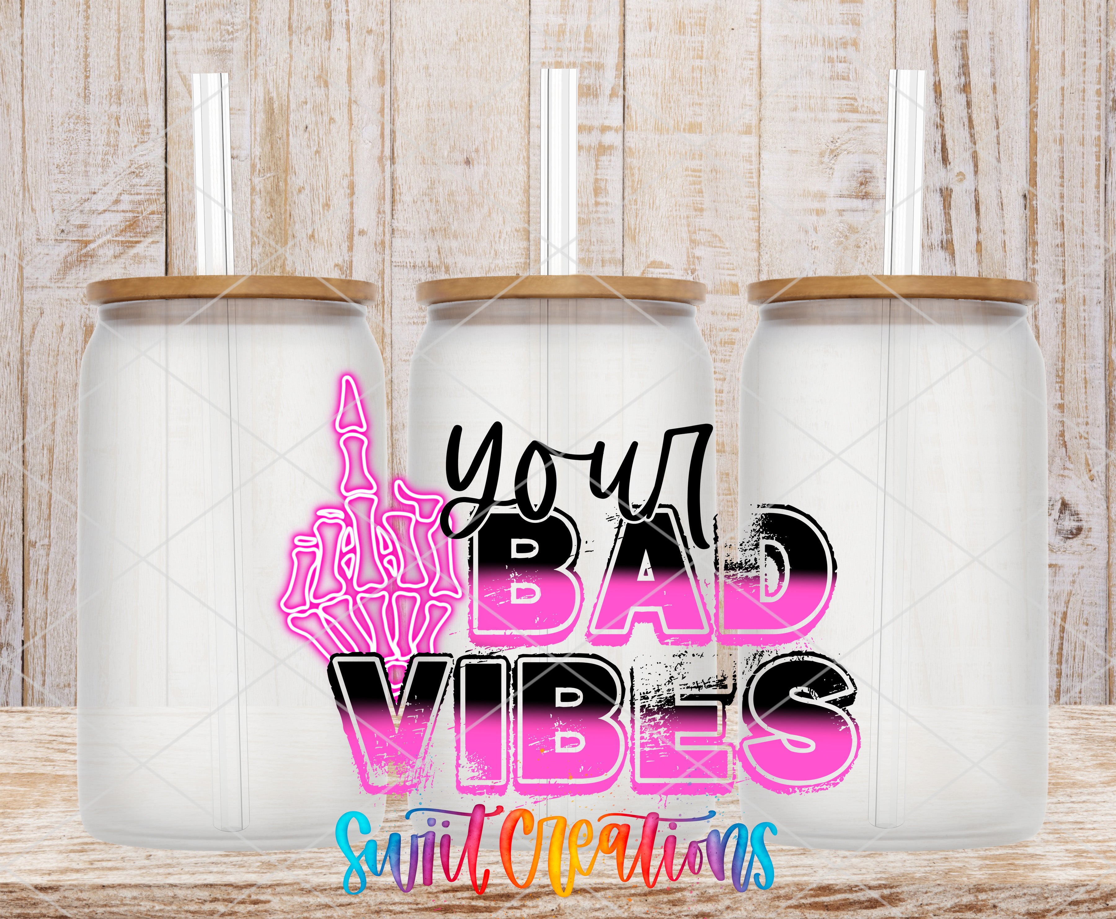 three glass jars with lids, each containing a straw. The jars are arranged in a row, and there is a text overlay in the center that reads "Your Bad Vibes" in a stylized font.