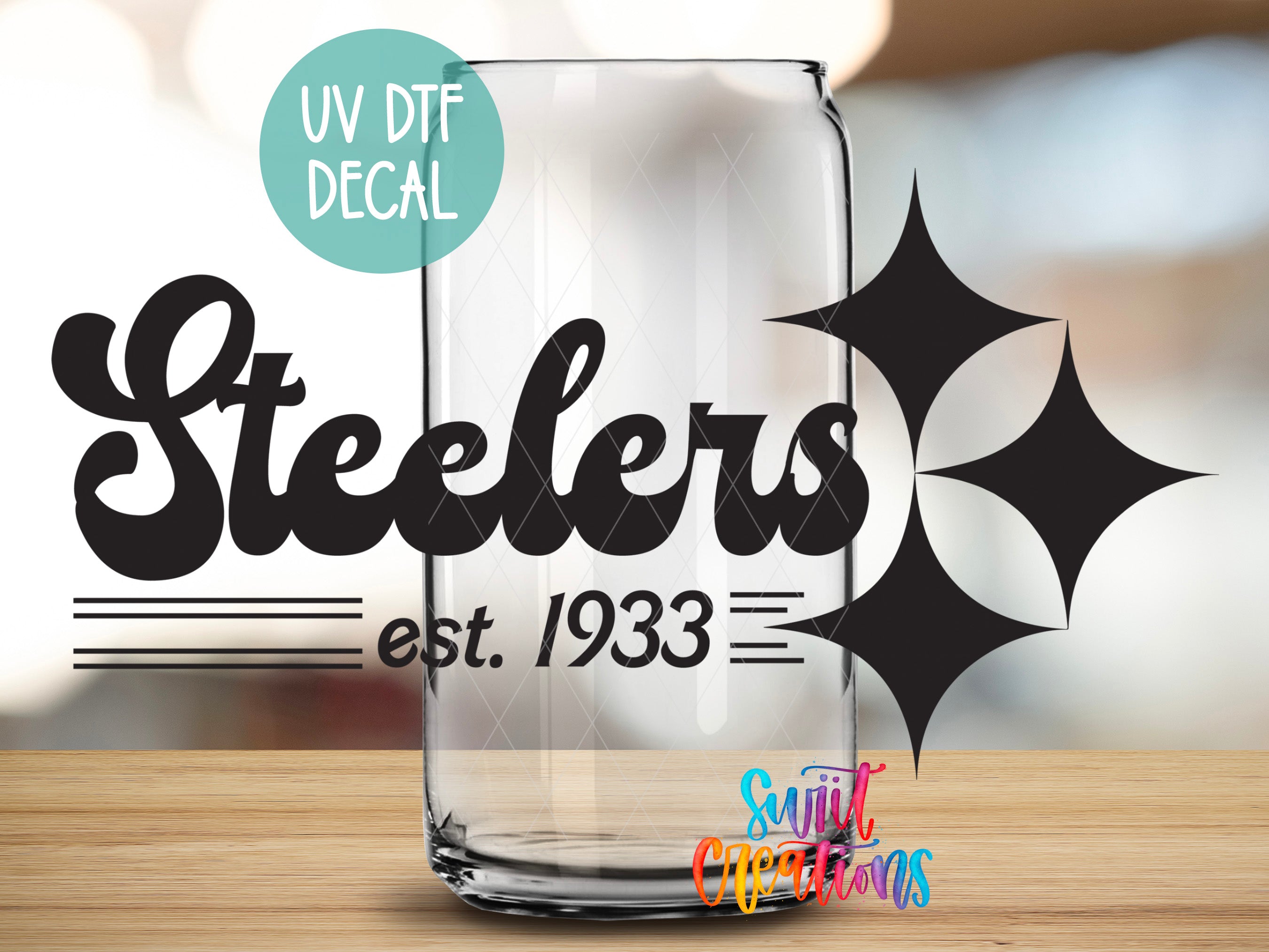 a glass with the name steeles on it