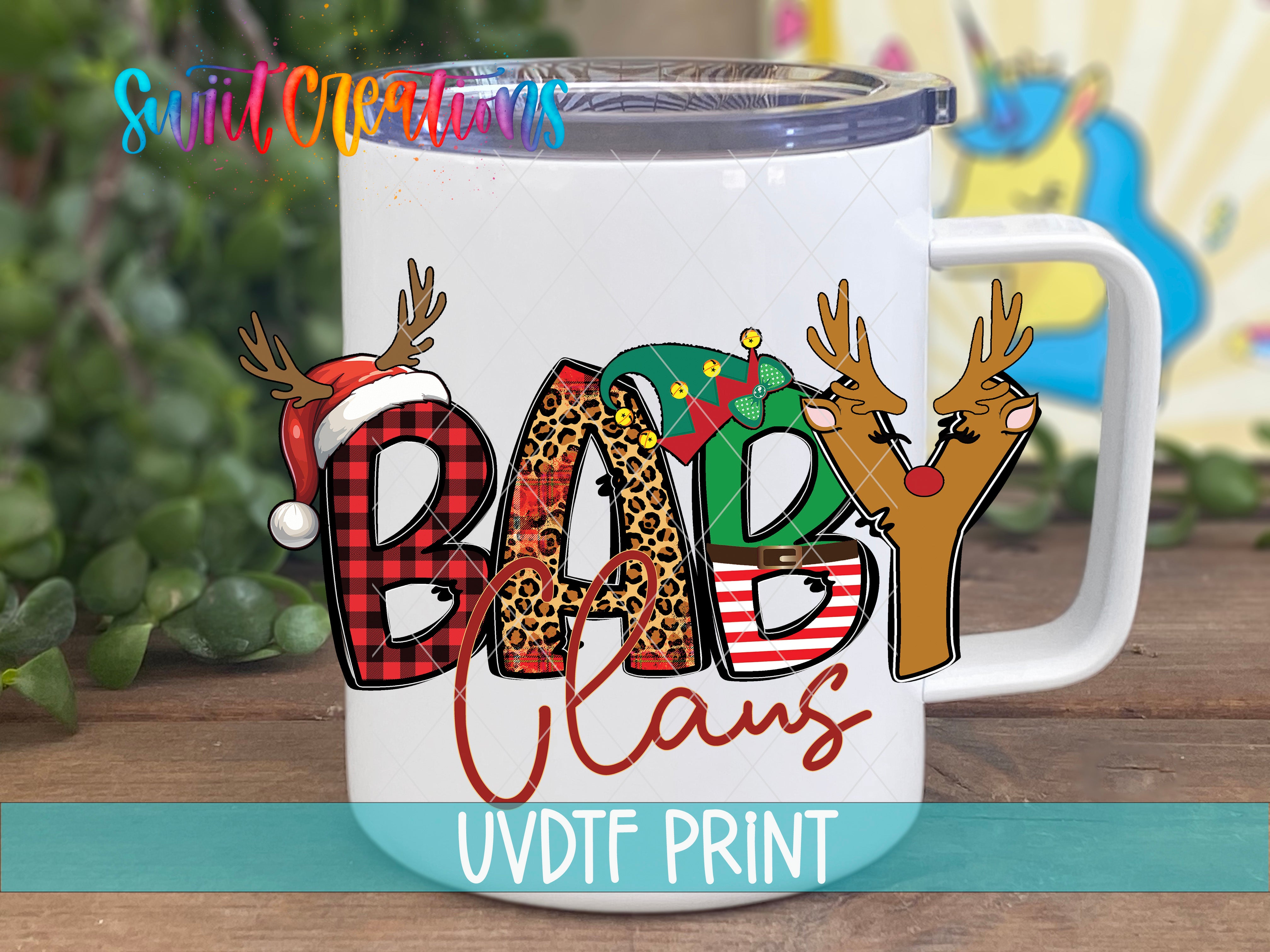 A white mug with a colorful design featuring the word "BABY CLANS" and various Christmas-themed elements such as reindeer and snowflakes.