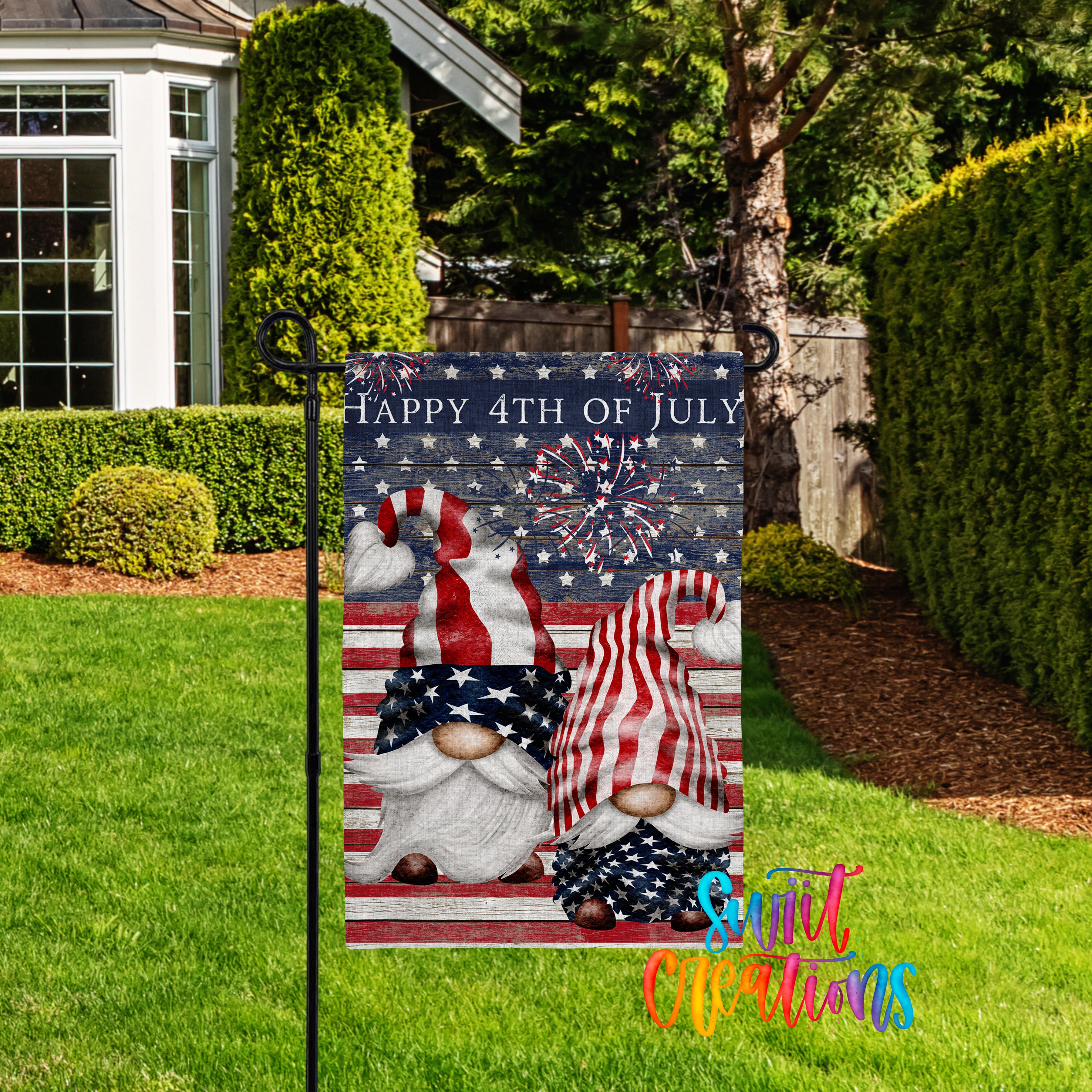 A patriotic flag with two gnomes wearing American flags and fireworks in the background, celebrating the 4th of July.