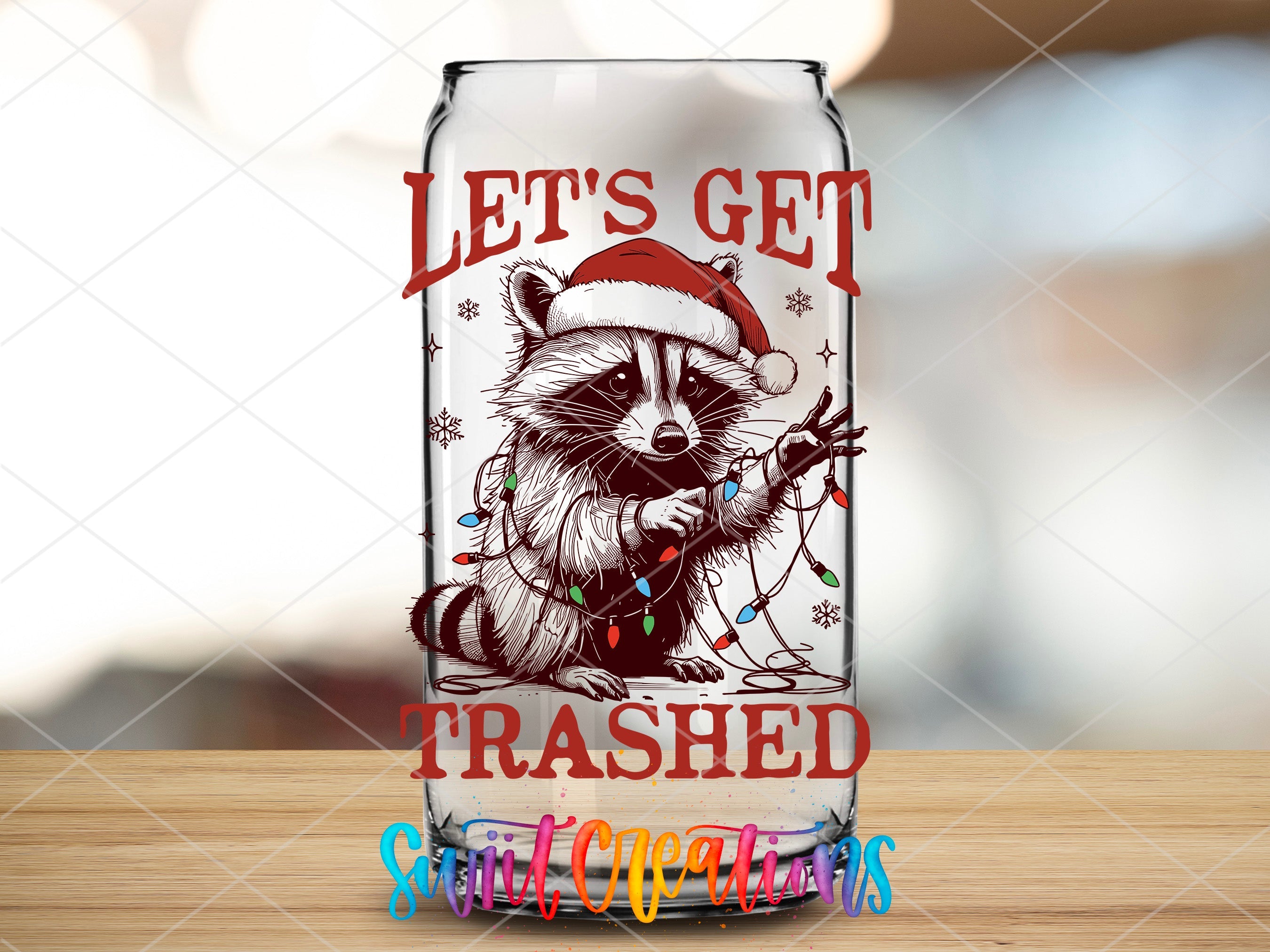 a glass with a raccoon wearing a santa hat