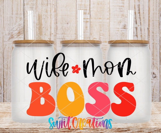 two coffee mugs with the words wife and boss on them
