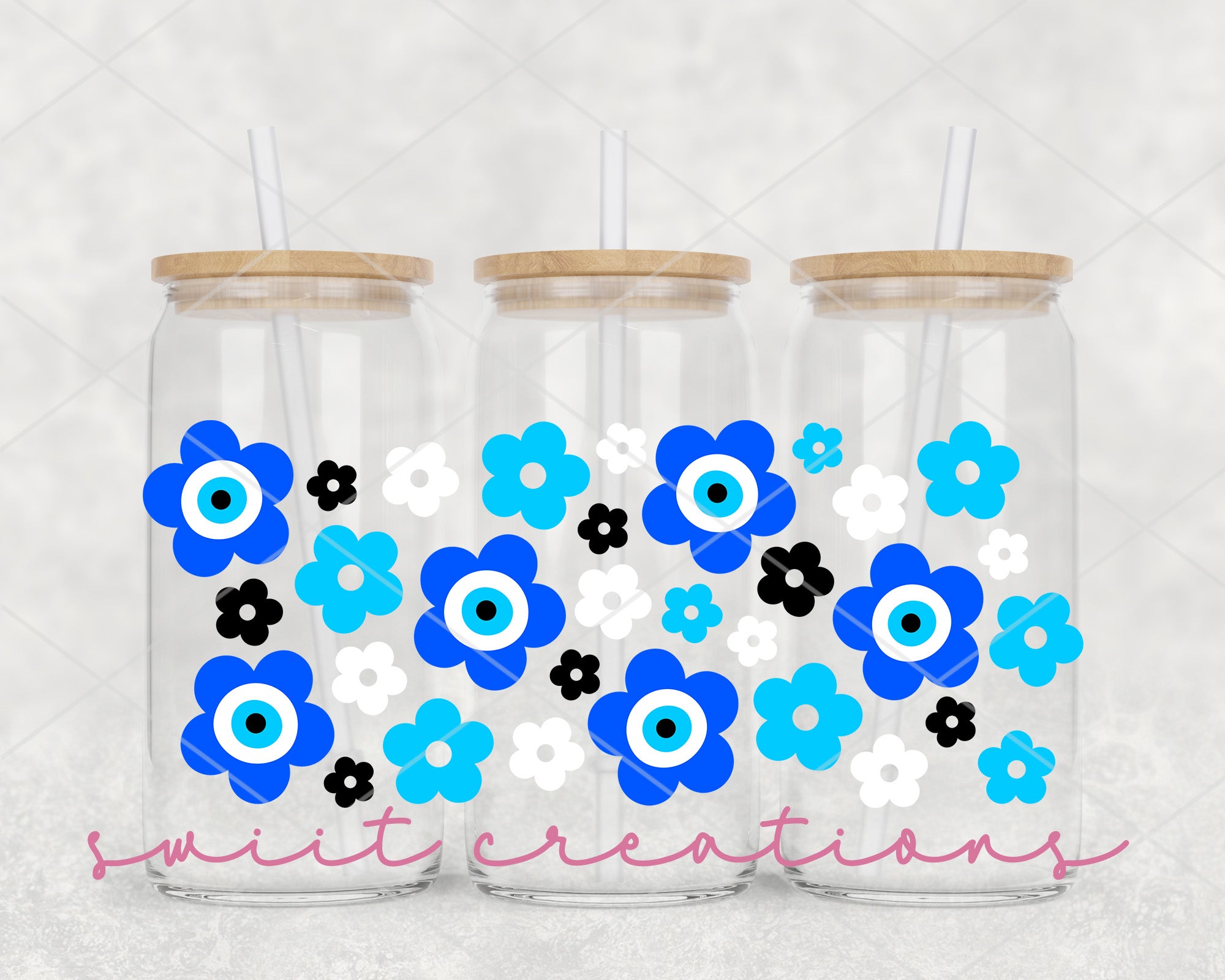 a couple of mason jars filled with blue and white flowers