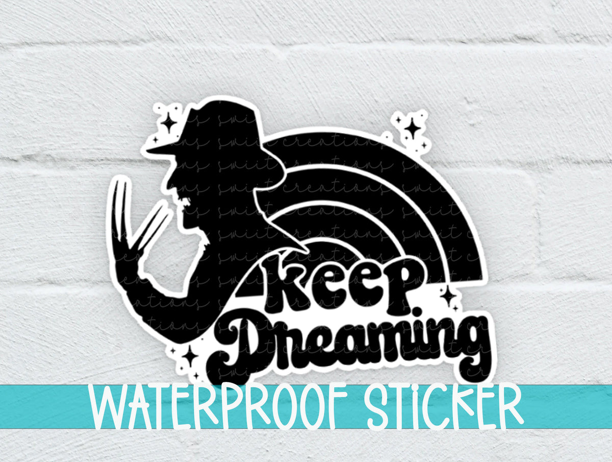 Keep Dreaming sticker on a white brick background with a waterproof sticker banner