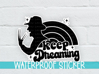 Keep Dreaming sticker on a white brick background with a waterproof sticker banner