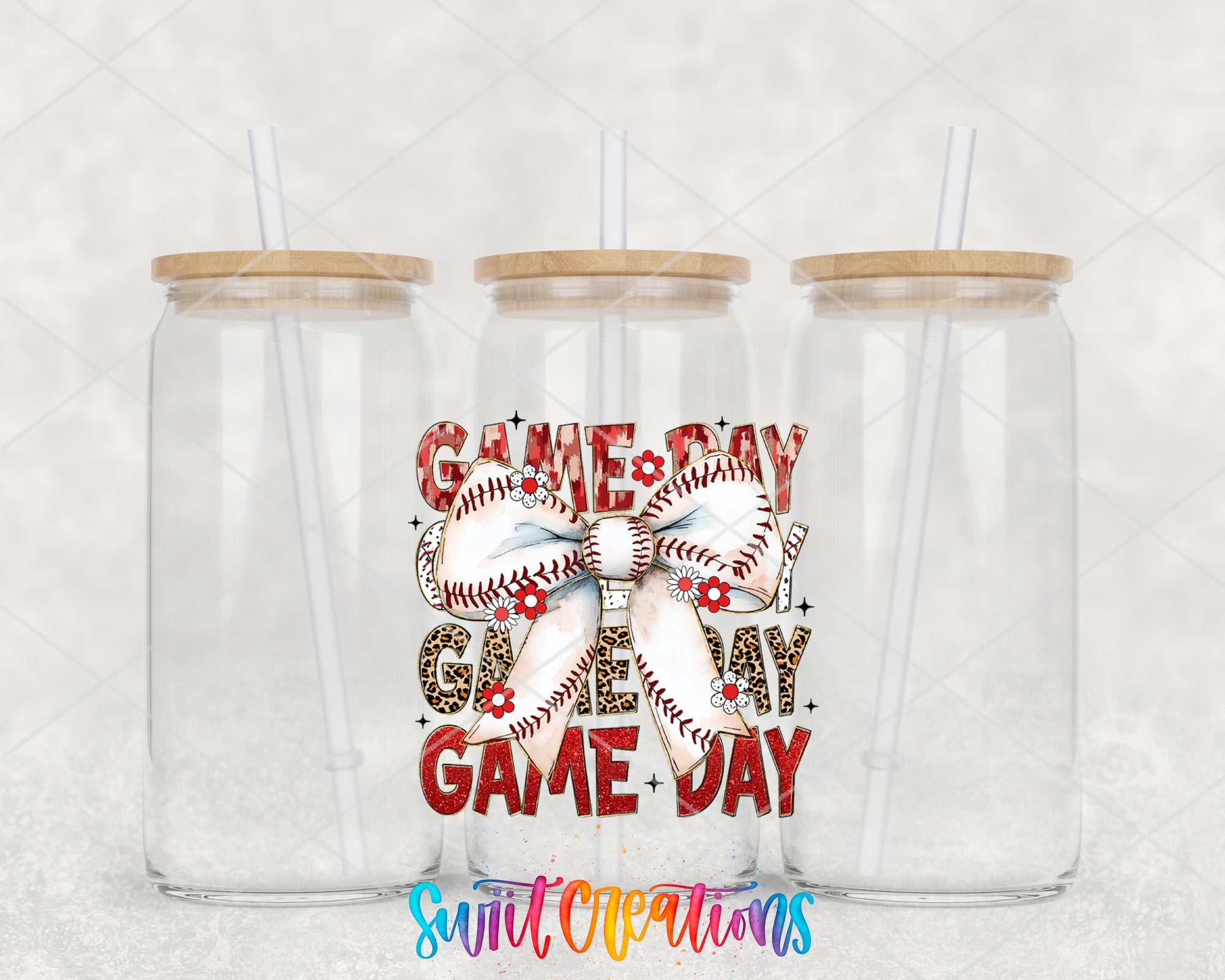 two clear tumblers with baseballs and bows on them
