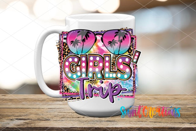 a coffee mug with the words girls trip on it