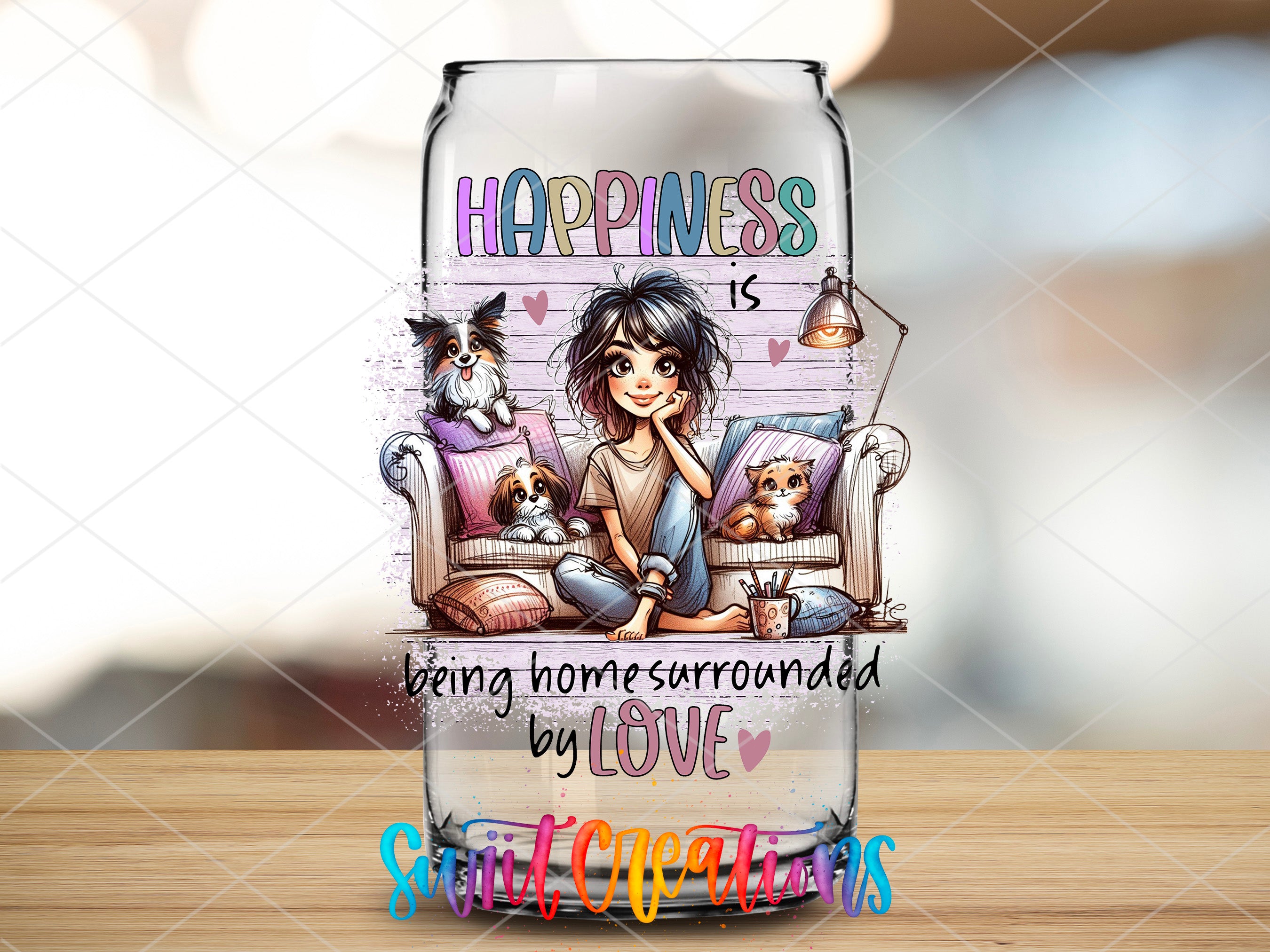 a glass bottle with a picture of a girl and cats on it